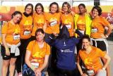Group photo of female Liberty Specialty Markets employees participating in the Paris Women's marathon