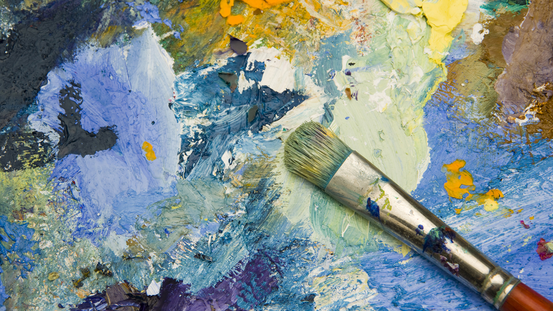 blue and gold paint with paintbrush