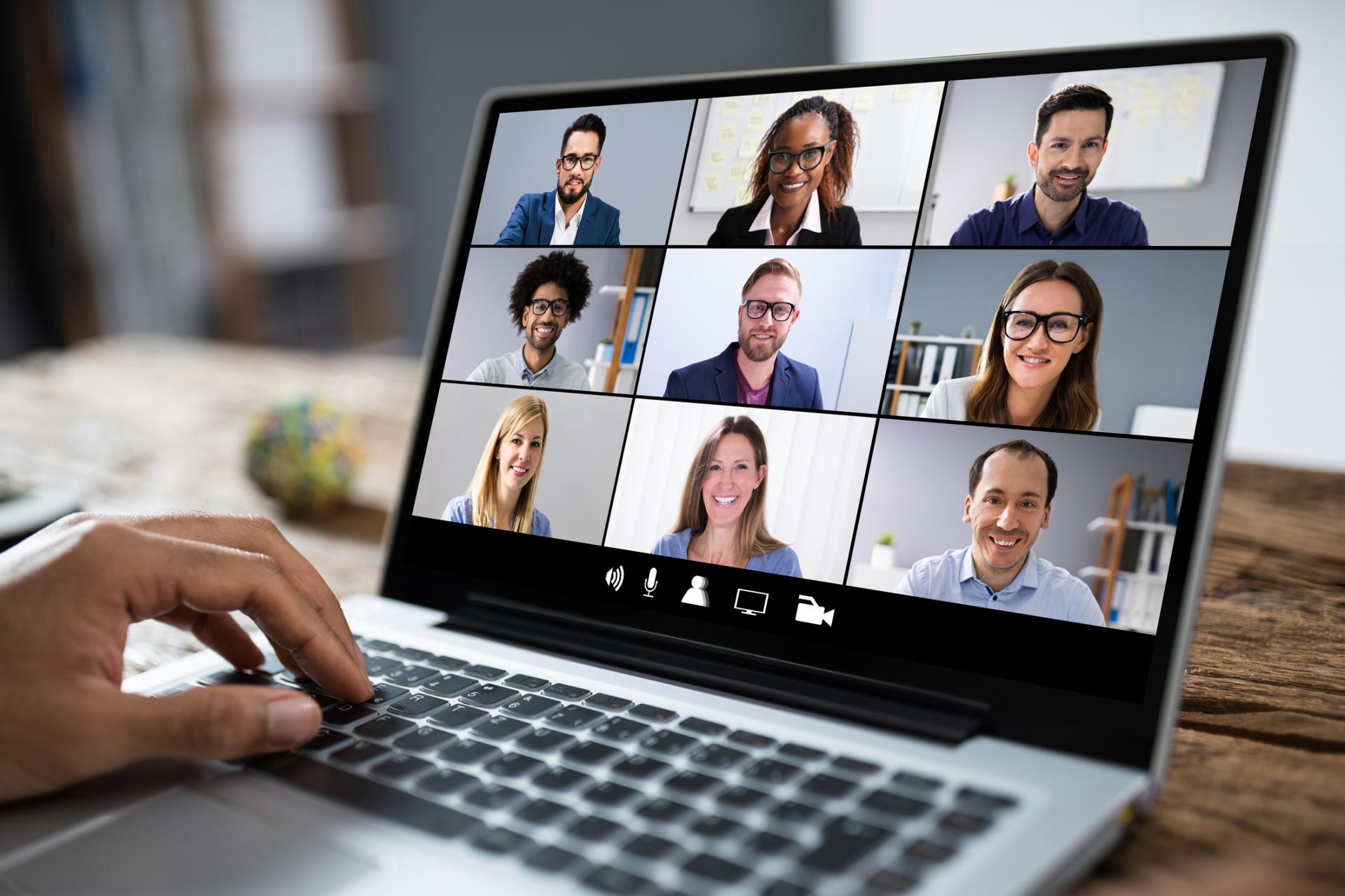 someone on a video call on their laptop