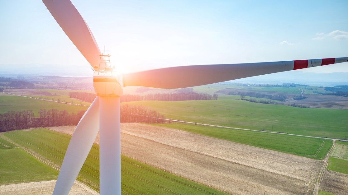 Wind turbine and sunrise - blog image