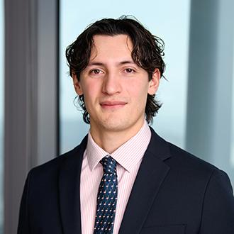 Headshot of Niall Tsang-Wetherald