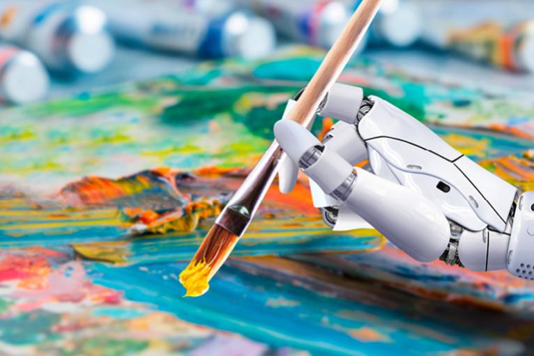Robot holding a paintbrush