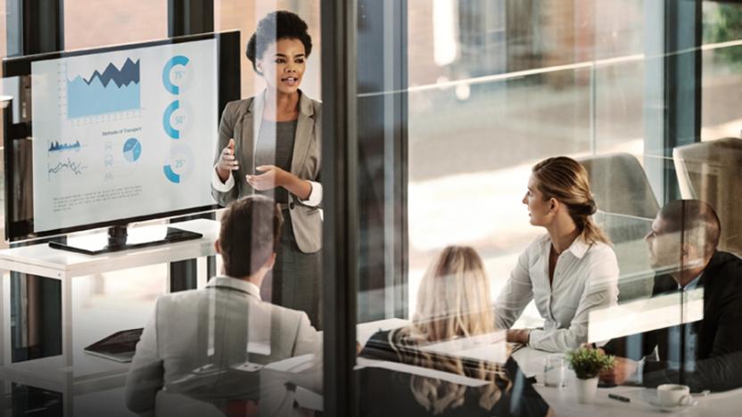 Businesswoman delivering a presentation to her colleagues in a boardroom