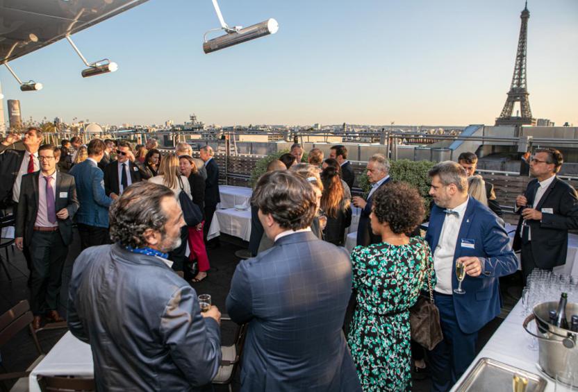 Outdoor cocktail reception with brokers in Paris