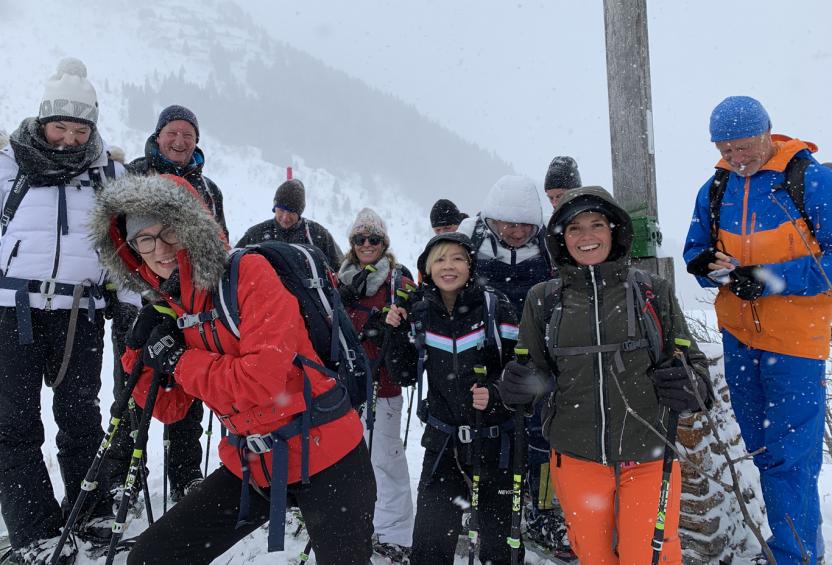 Group of Liberty Specialty Markets employees enjoying a snowy day on the ski slopes