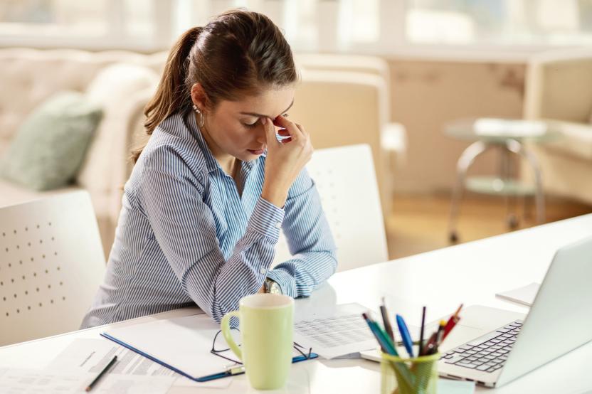 working at a desk with laptop